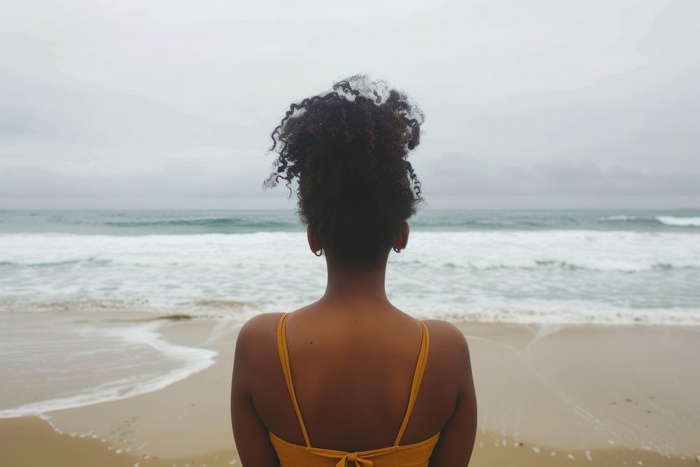 African American young woman standing beach adult.