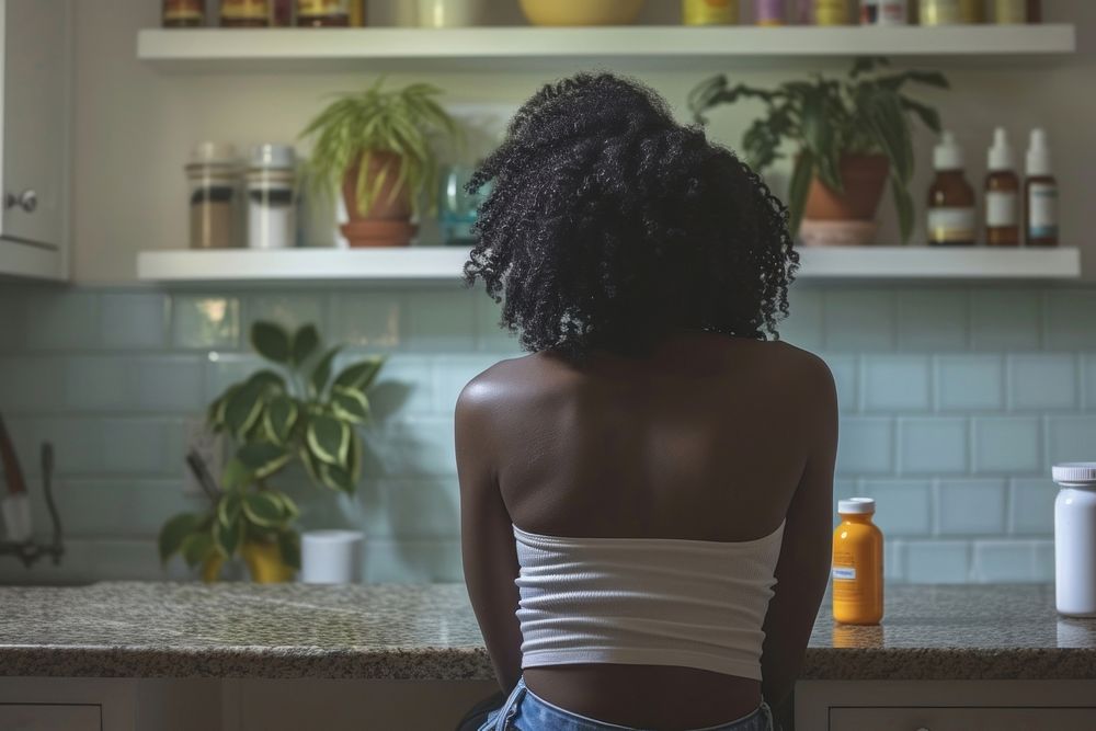 African American young woman kitchen sitting adult.
