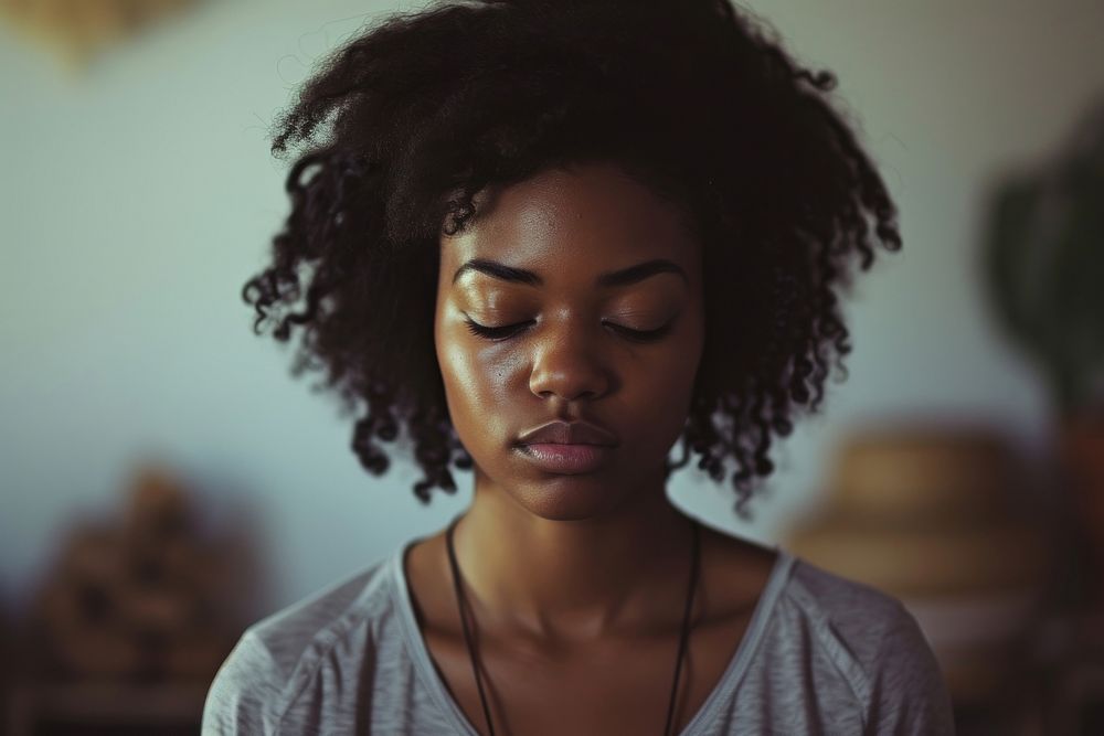 Black woman adult skin contemplation.