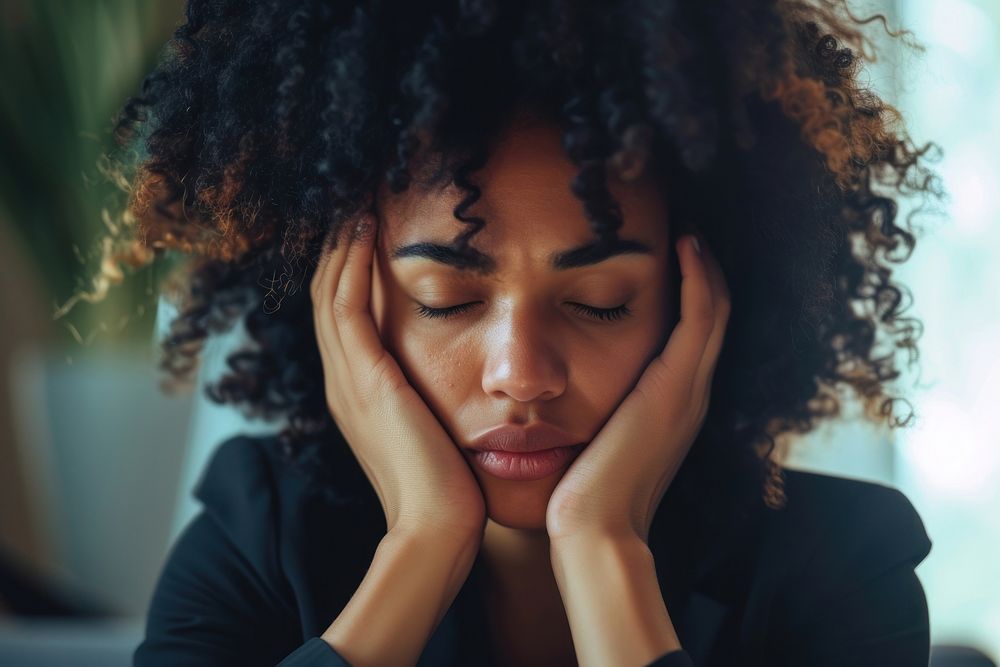 Black businesswoman worried adult pain.