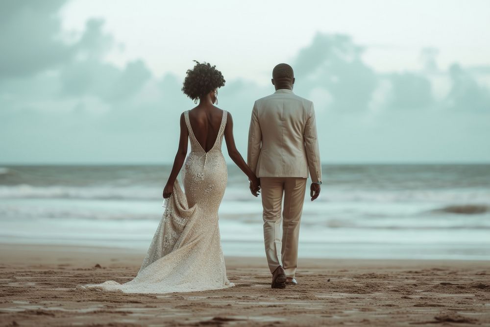 African wedding day couple walking beach adult.