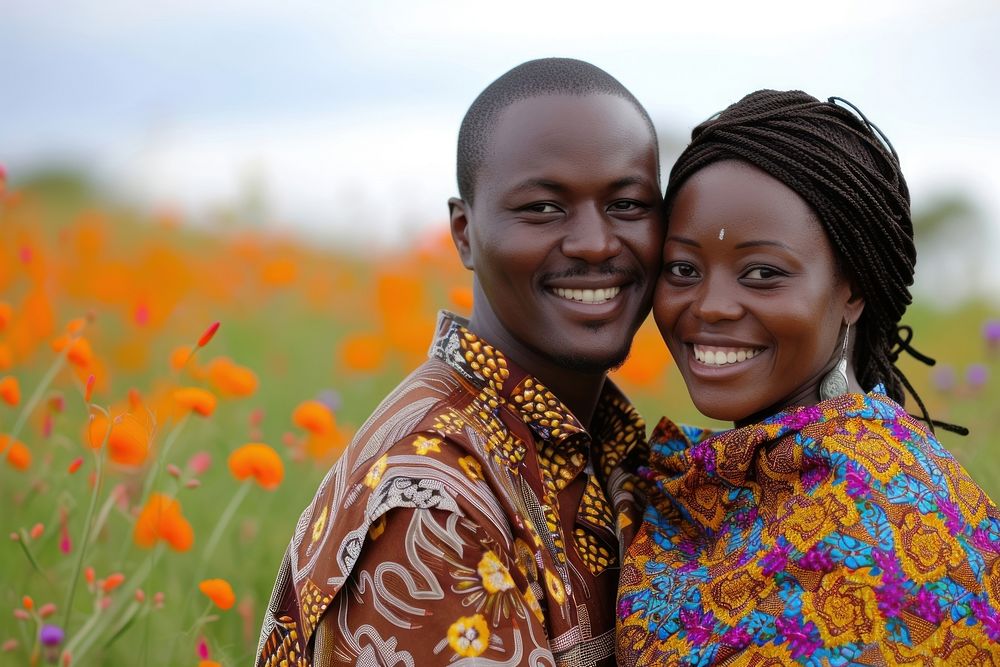 African women couple portrait flower smiling.