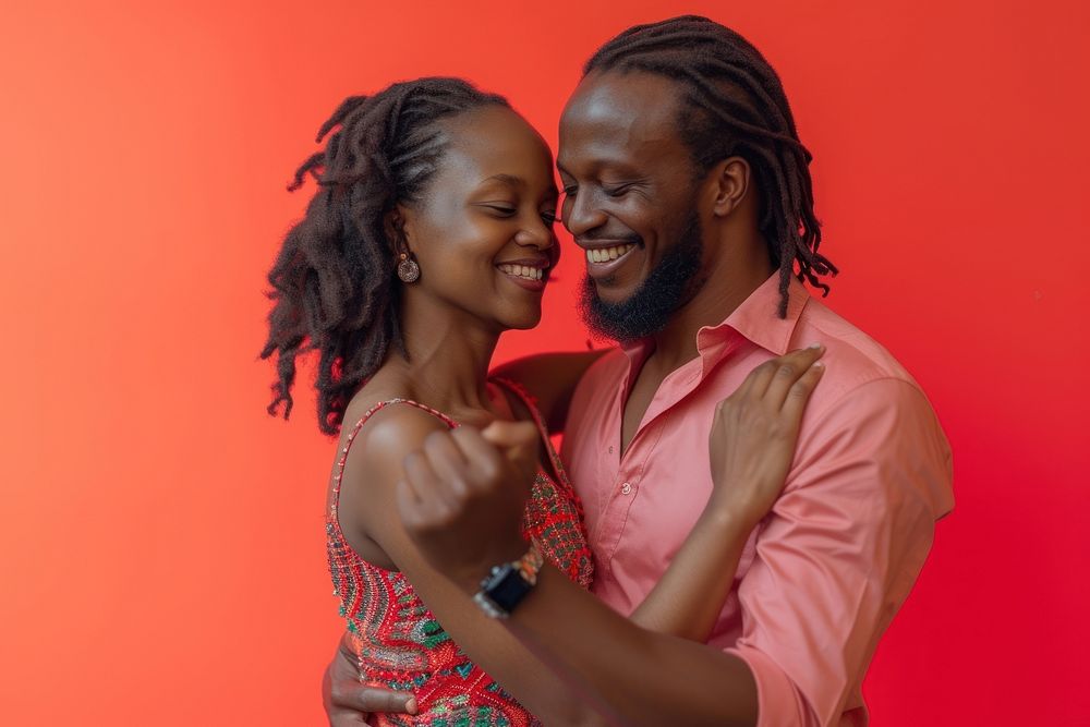African Descent Couple Dancing Wedding Celebration laughing portrait smiling.