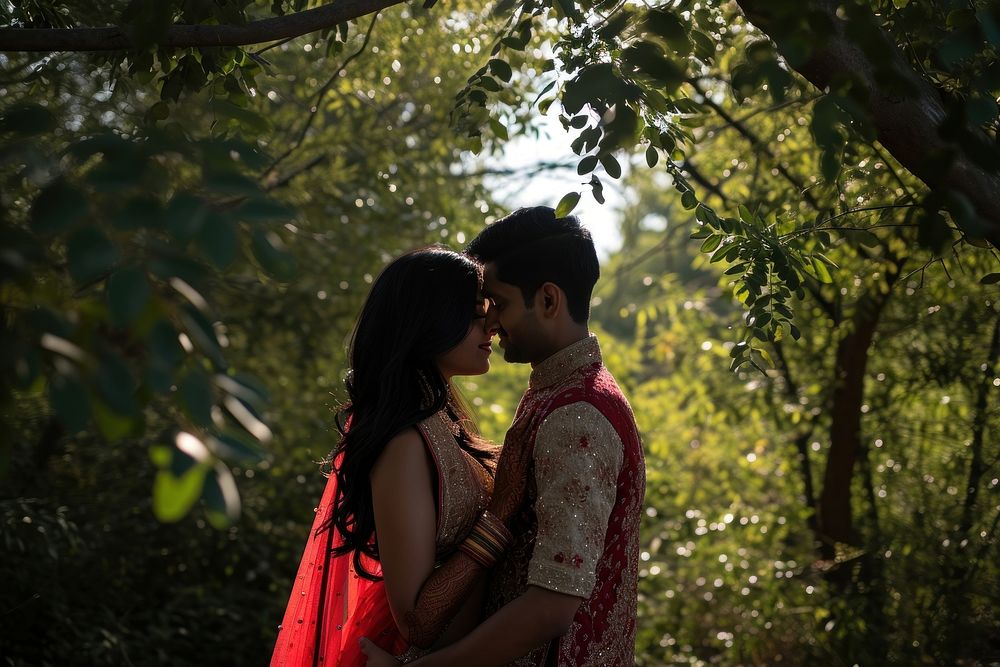Indian couple kissing wedding person.