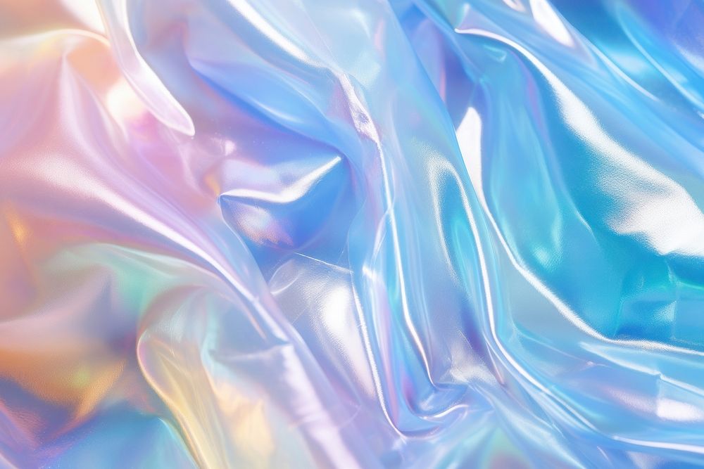 Transparent light blue plastic wrap texture backgrounds rainbow refraction.