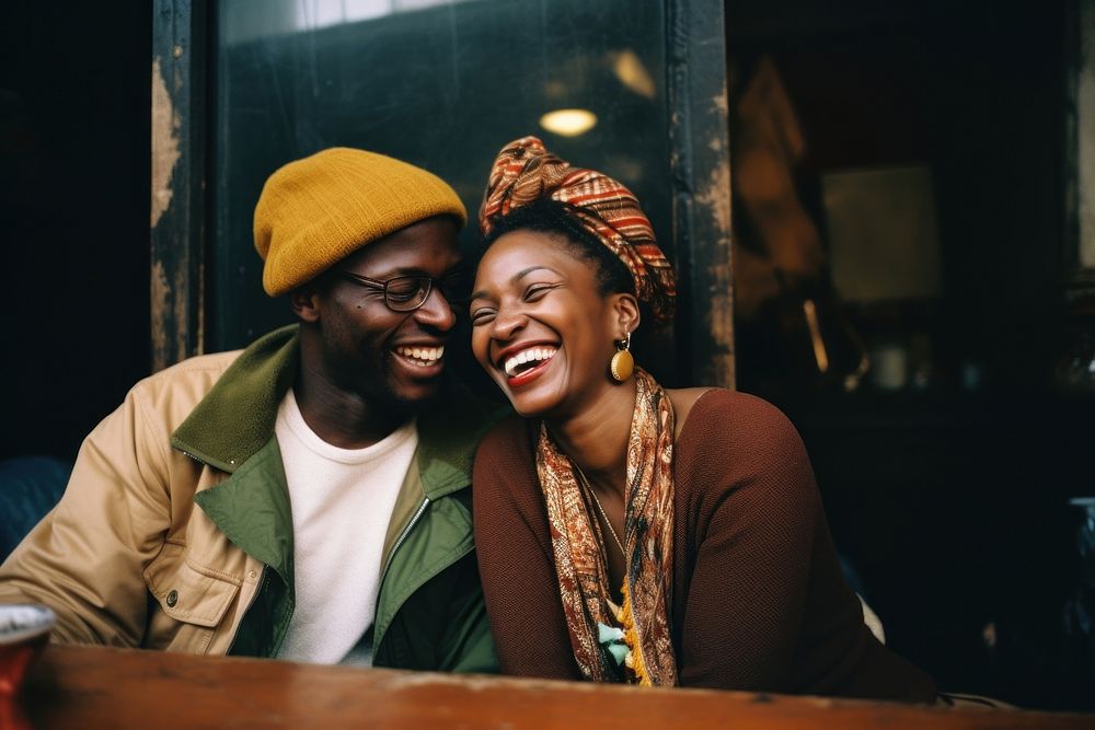 African couple laughing adult smile.