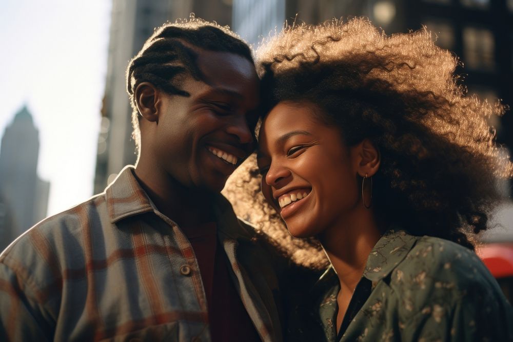 African couple laughing portrait adult.
