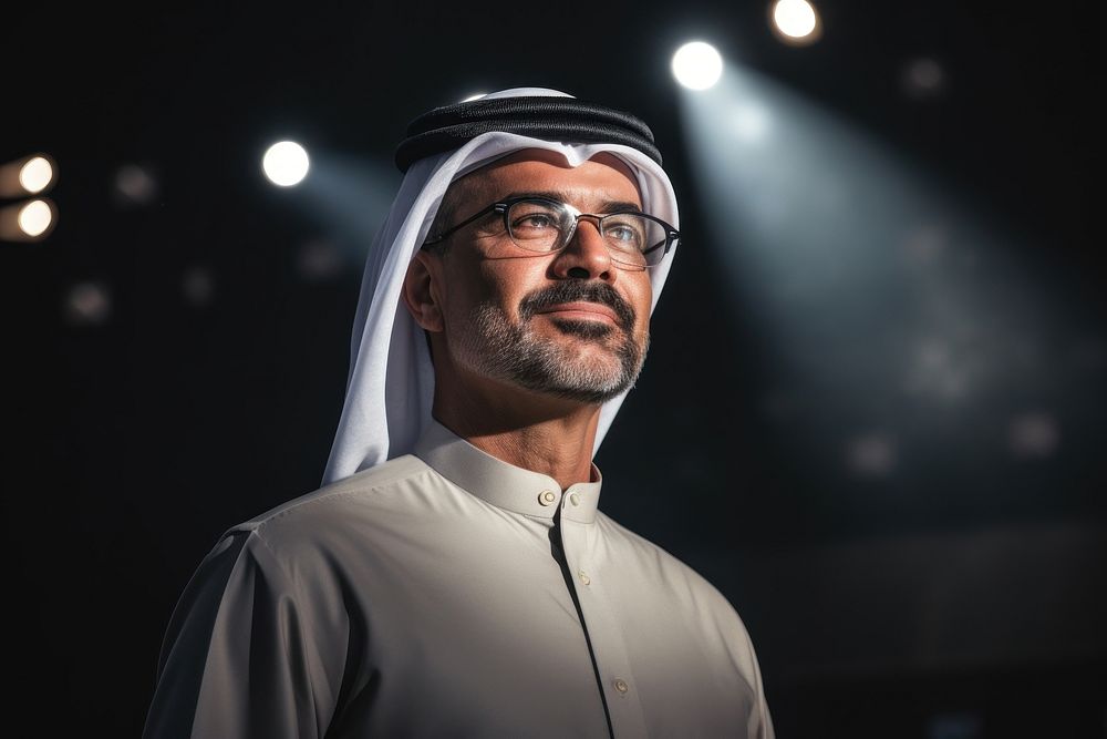 Arab business man portrait glasses standing.