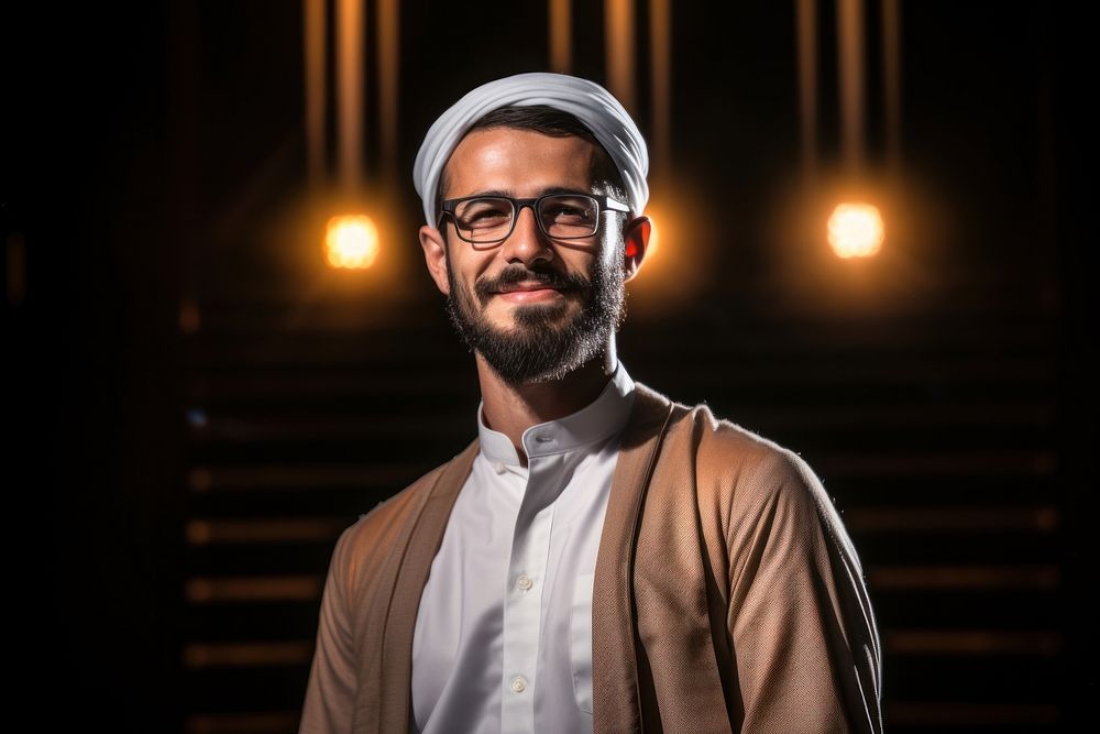 Arab businessman portrait glasses standing.