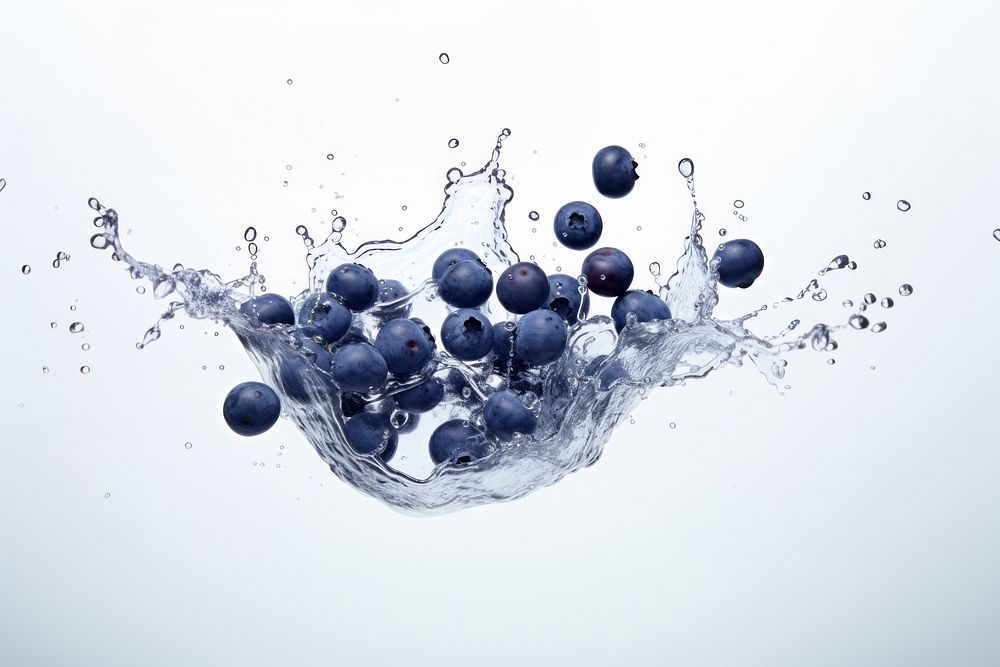 Blueberry floating with splash falling fruit refreshment.