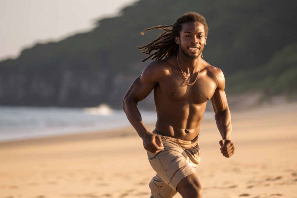 African man running beach determination.