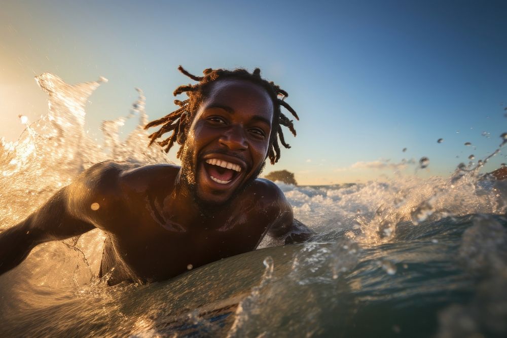 Happy African man swimming laughing sports.