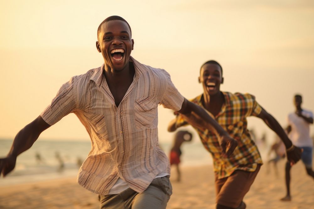 Happy African men laughing beach adult.