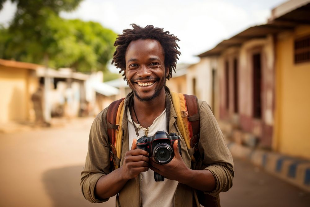 Happy African photographer man camera holding smile.