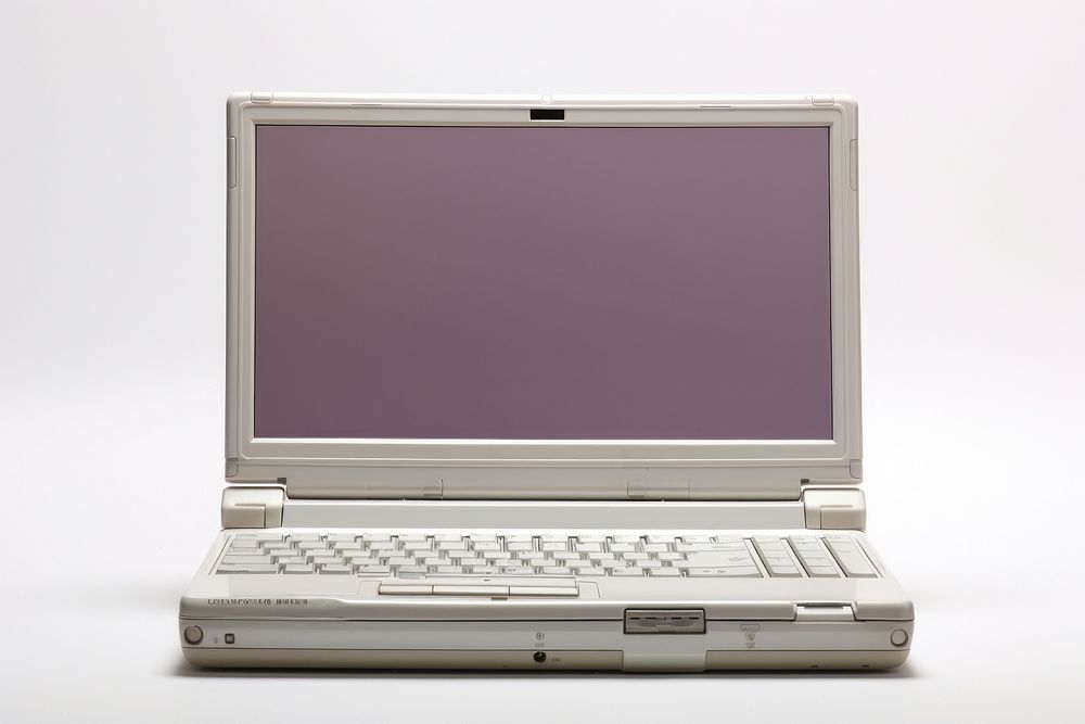 Y2K Laptop with blank screen laptop computer white background.