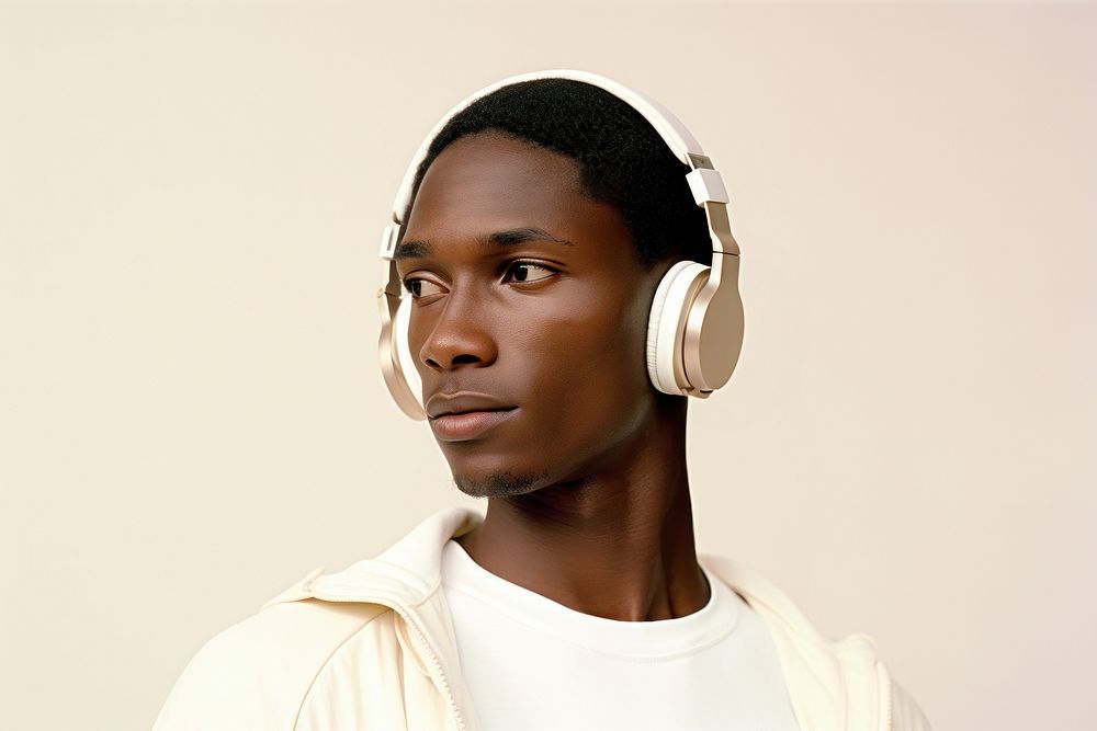 African-American man wearing headphone listening to music headphones photography portrait.