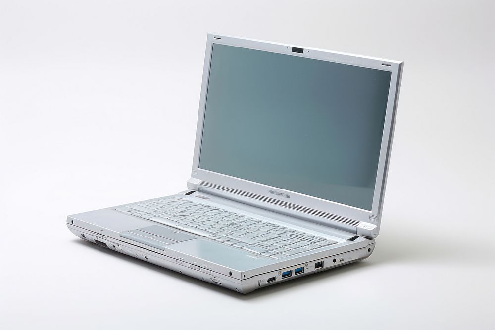 Frutiger aero Laptop with blank screen laptop computer white background.