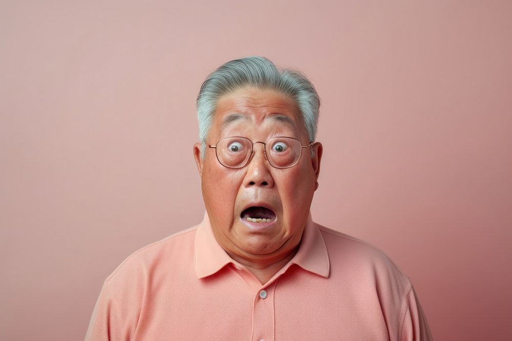 Chinese Grandfather suprised face portrait photography glasses.
