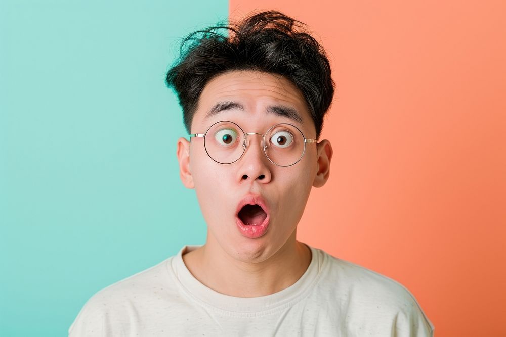 Chinese man surprised face portrait glasses accessories.