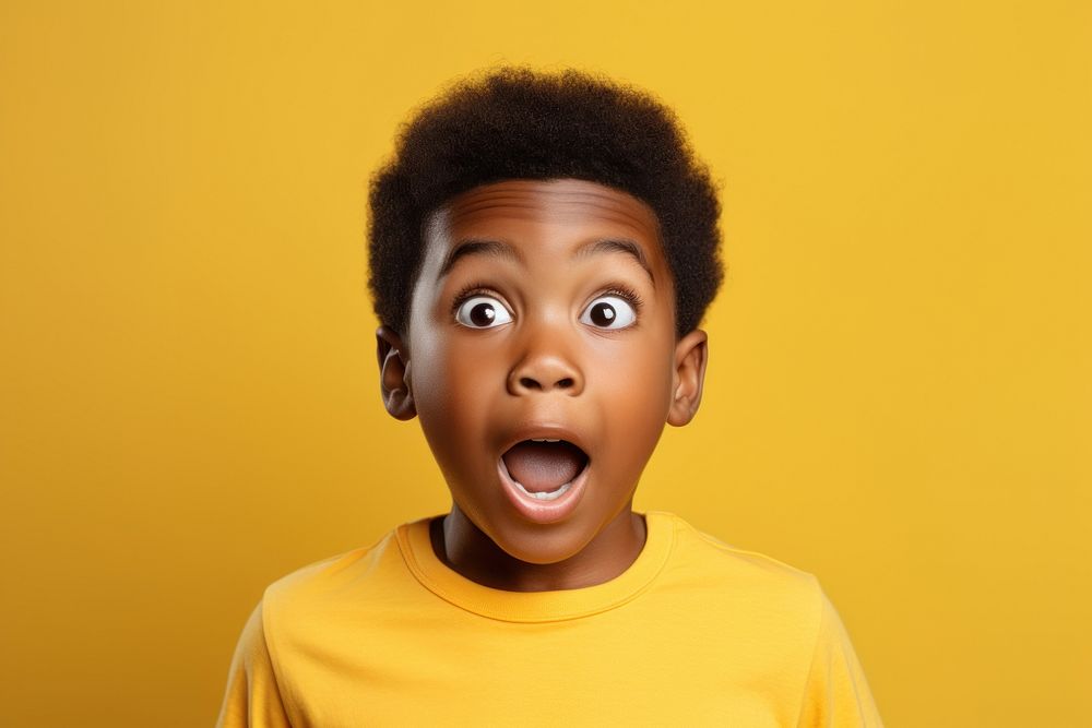 African kids surprised face portrait child happiness.