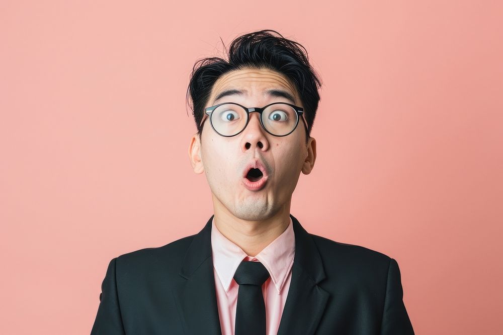 Asian businessman surprised face portrait photography glasses.