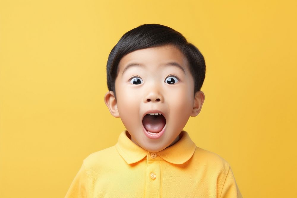 Asian kids surprised face portrait baby happiness.