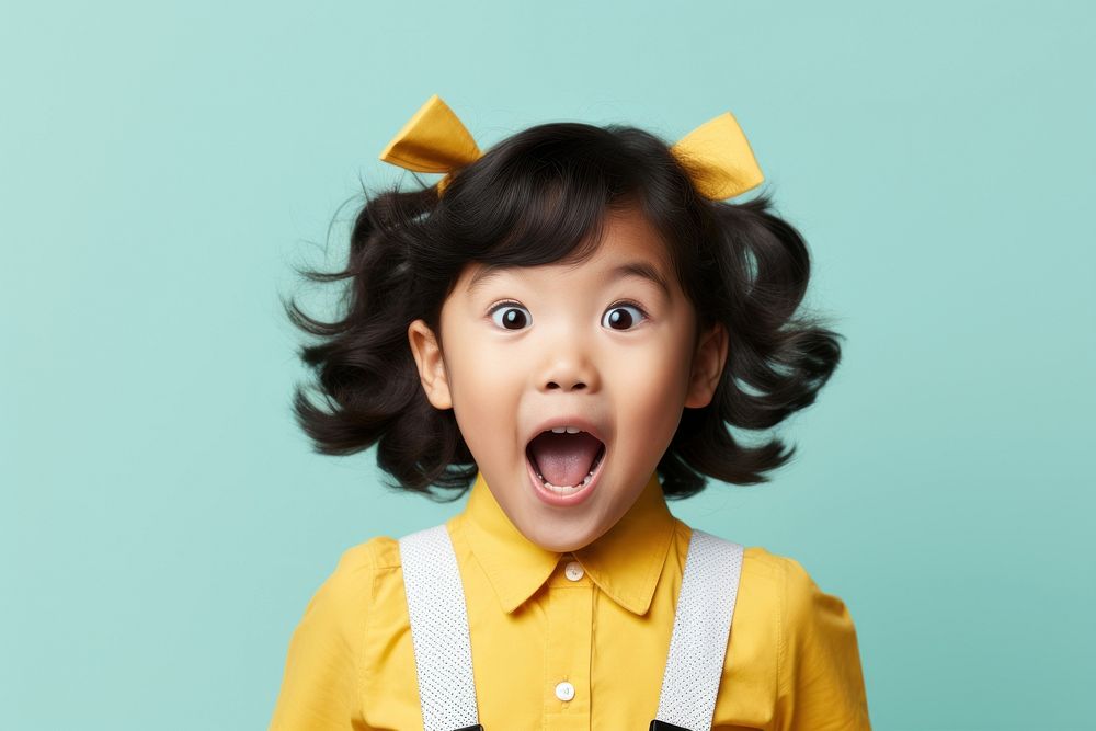 Asian kids surprised face portrait photography happiness.