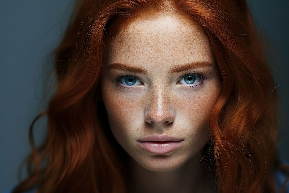 Portrait of red haired girl portrait freckle photography.