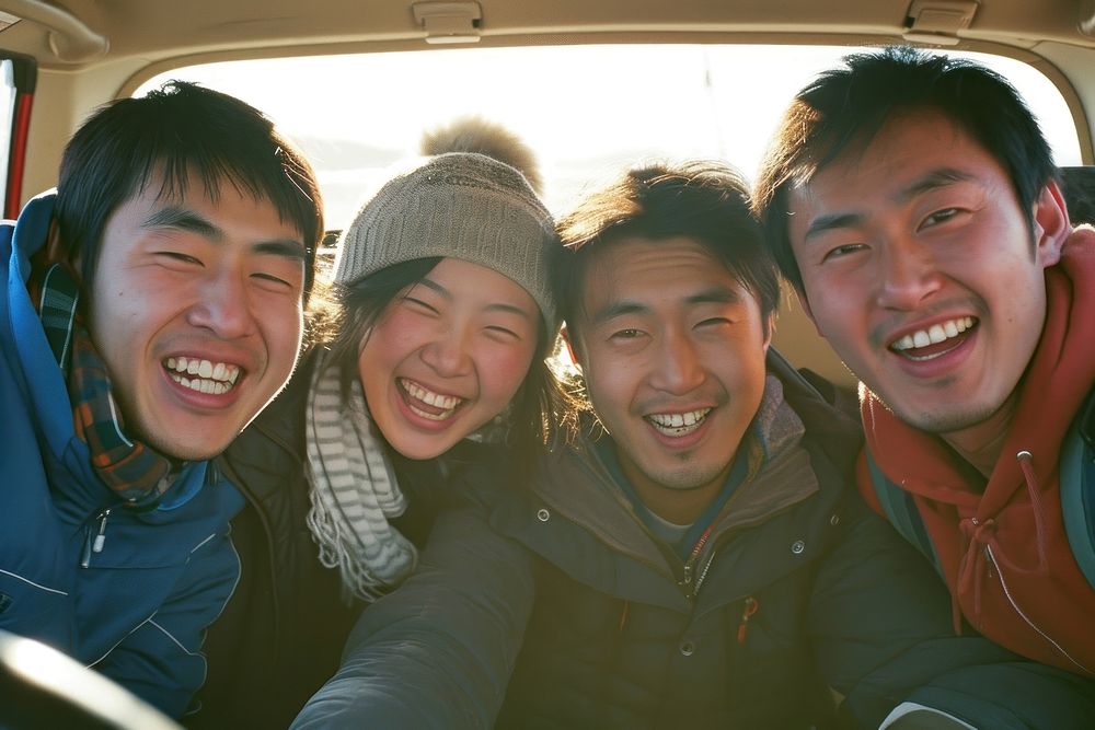 Asian friends group road trip laughing portrait selfie.