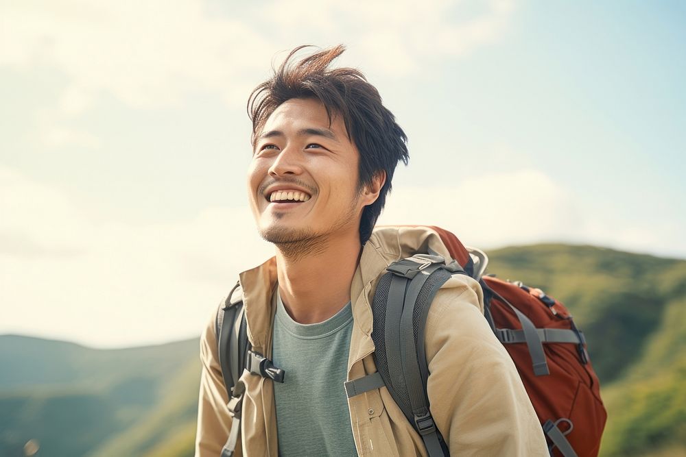 Happy japanese man mountain looking travel.