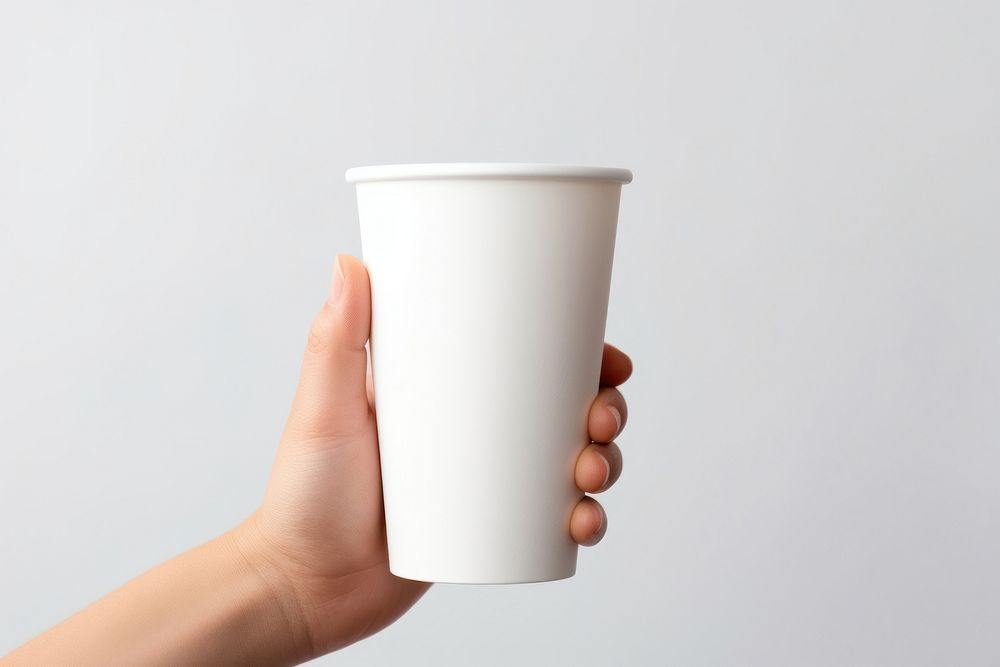 Plastic cup  hand holding coffee.