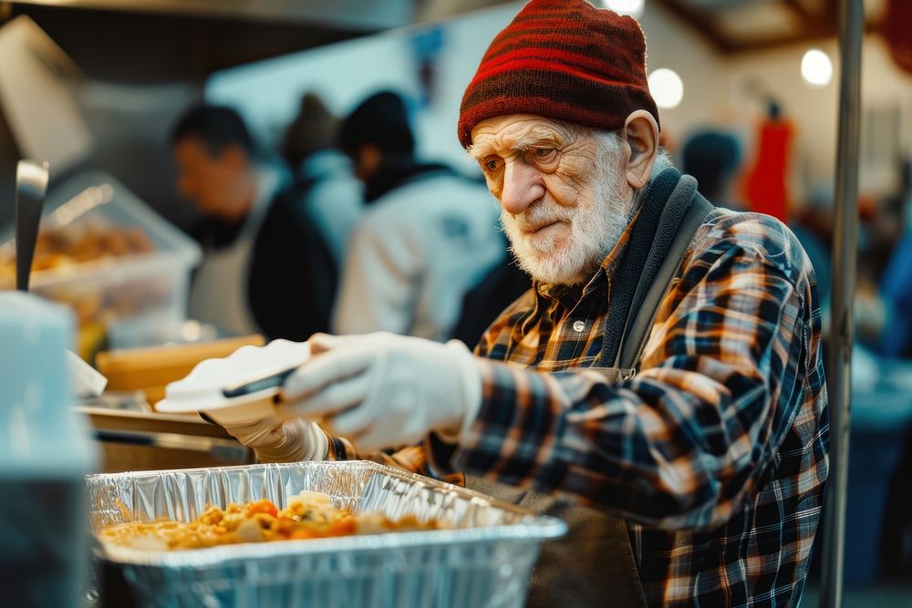 Elderly man volunteering at a shelter food adult freshness. AI generated Image by rawpixel.