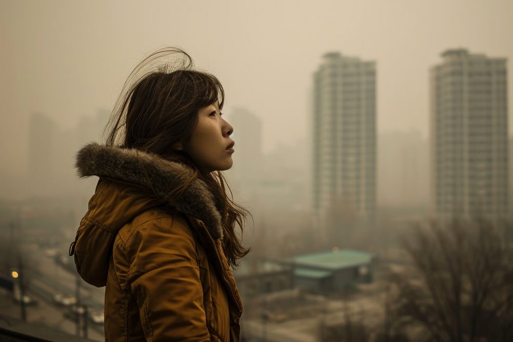 Asian woman in highly polluted air city smog photography outdoors. AI generated Image by rawpixel.