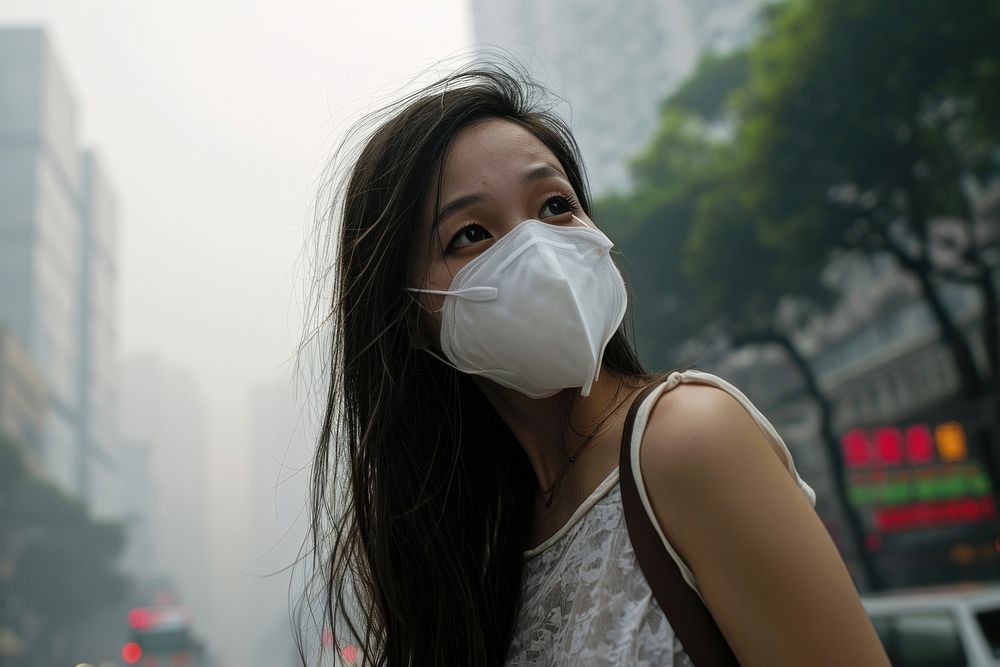 Asian woman in highly polluted air city outdoors adult smoke. AI generated Image by rawpixel.