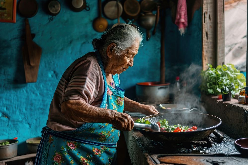 Elder latina cooking kitchen adult food. 