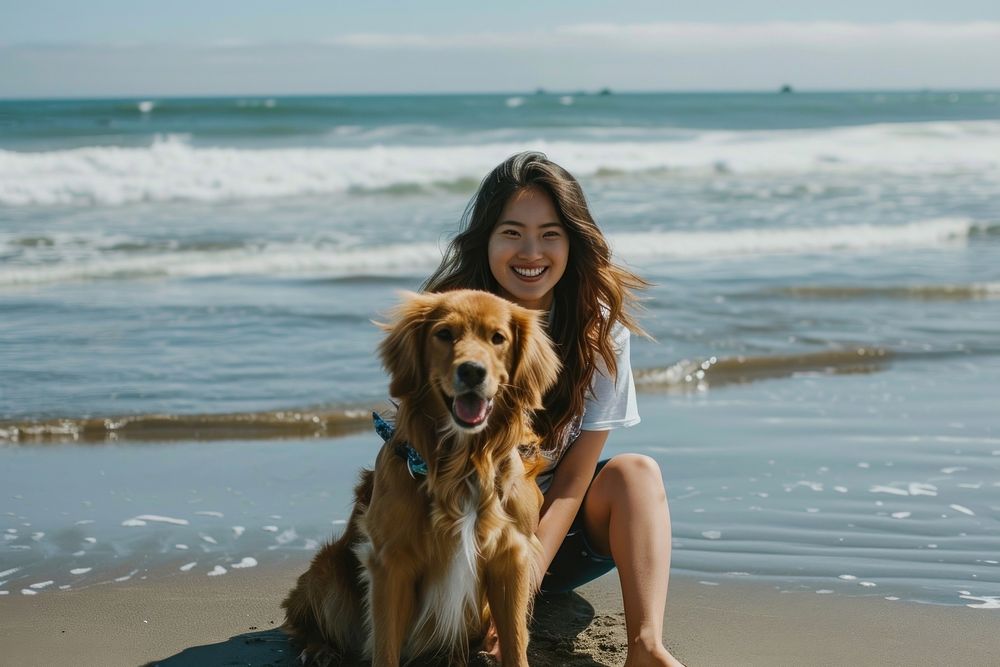 Asian woman with dog at the beach outdoors nature mammal.