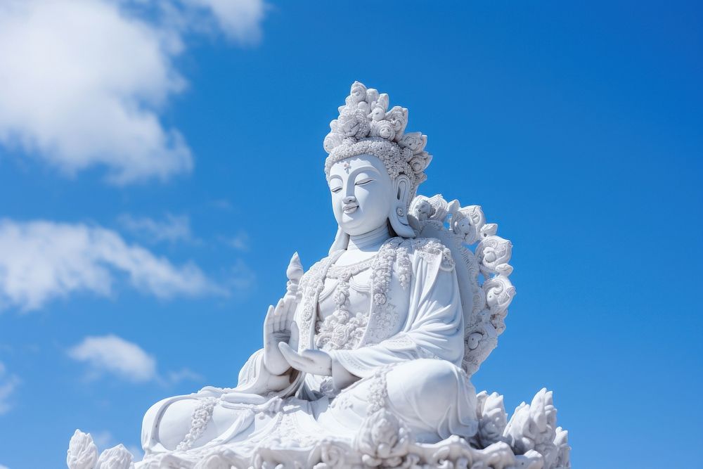 Guan yin statue blue sky representation. AI generated Image by rawpixel.