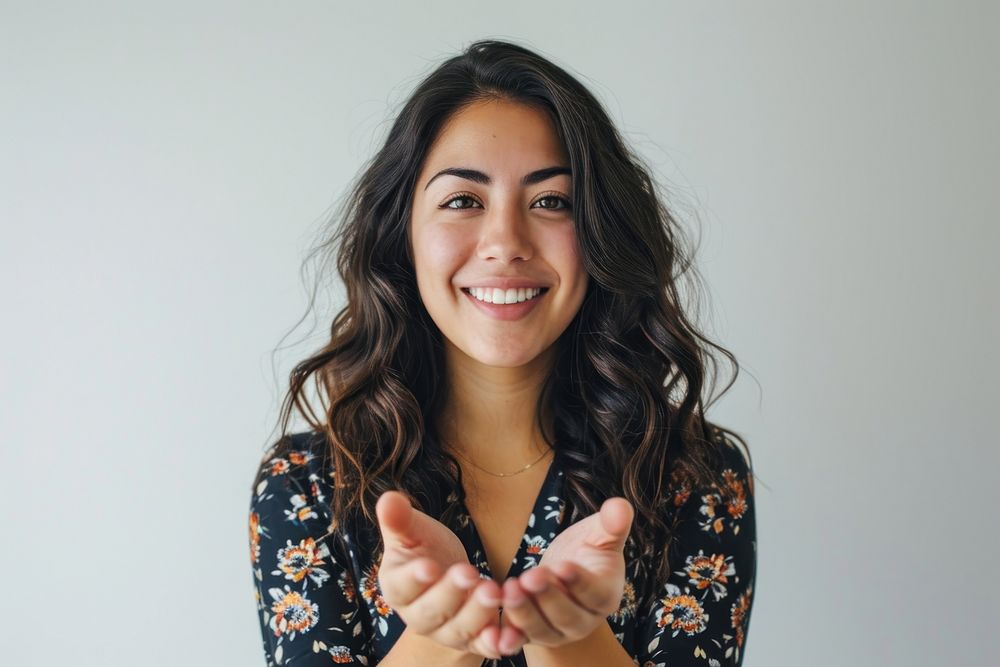  Young Latina woman portrait finger smile. AI generated Image by rawpixel.