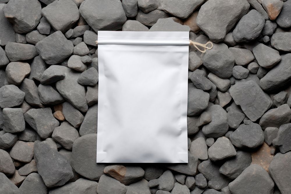 Paper pouch packaging  rock white outdoors.