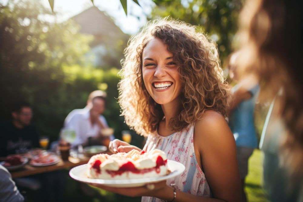 Woman eating cake laughing dessert smile.