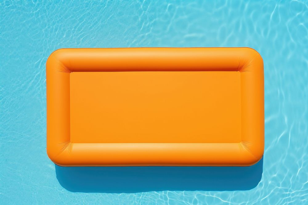  Orange inflatable floating pool raft mattress rectangle furniture outdoors. AI generated Image by rawpixel.