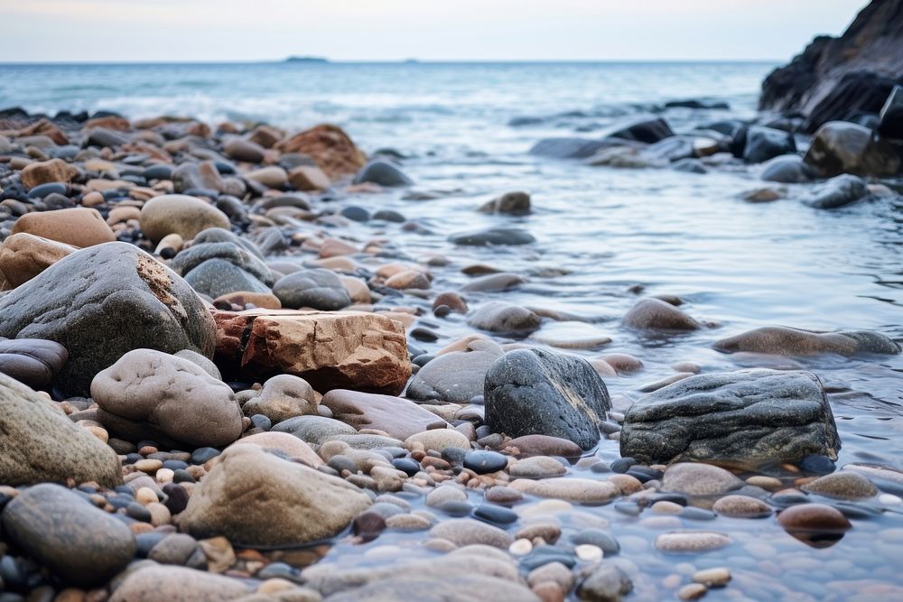 Rocks by the sea coast outdoors nature.