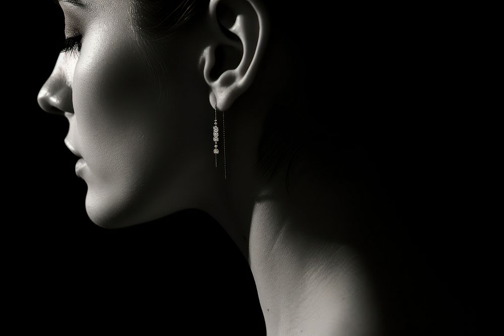 Ear wearing earrings photography portrait jewelry.