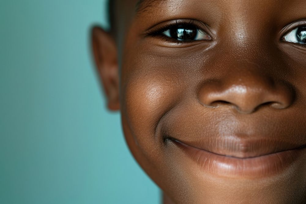 Black boy smiling skin baby face.