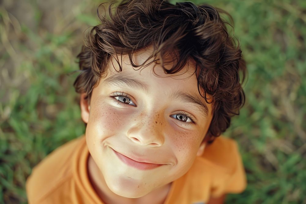 Little boy smiling photography portrait outdoors.