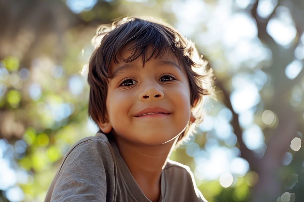 Little boy smiling photography portrait outdoors.