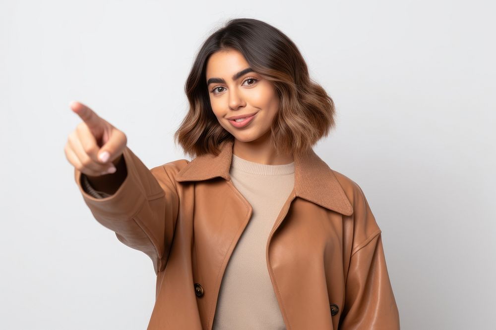 Young Argentinian woman pointing finger over portrait jacket adult. AI generated Image by rawpixel.