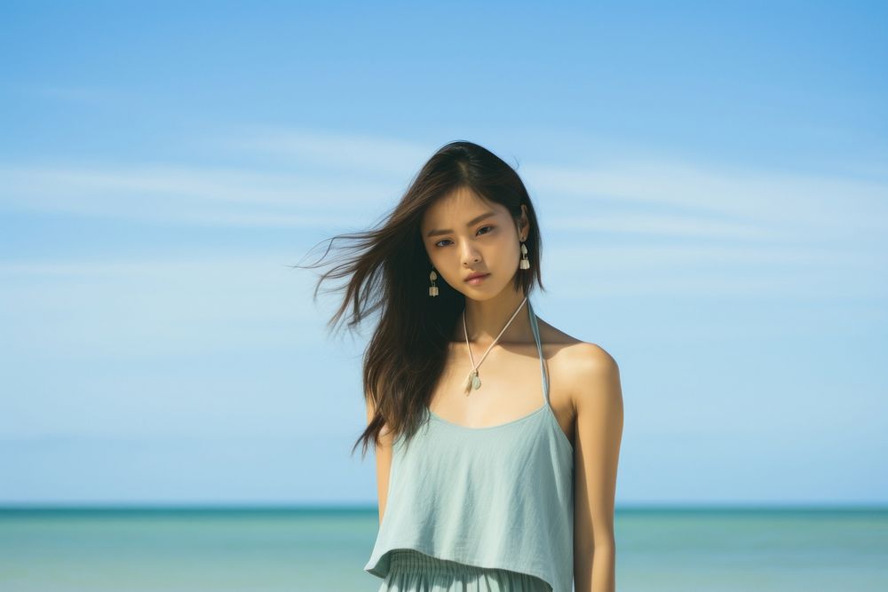 Asian woman portrait fashion beach. AI generated Image by rawpixel.
