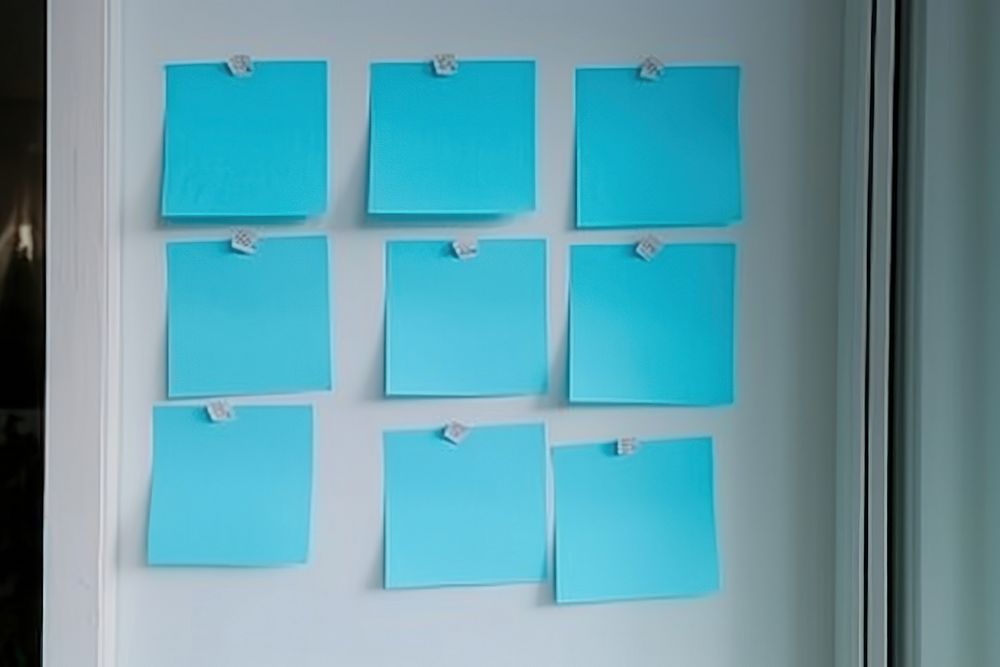 Blue adhesive note pinned to notice board blue turquoise hanging. AI generated Image by rawpixel.