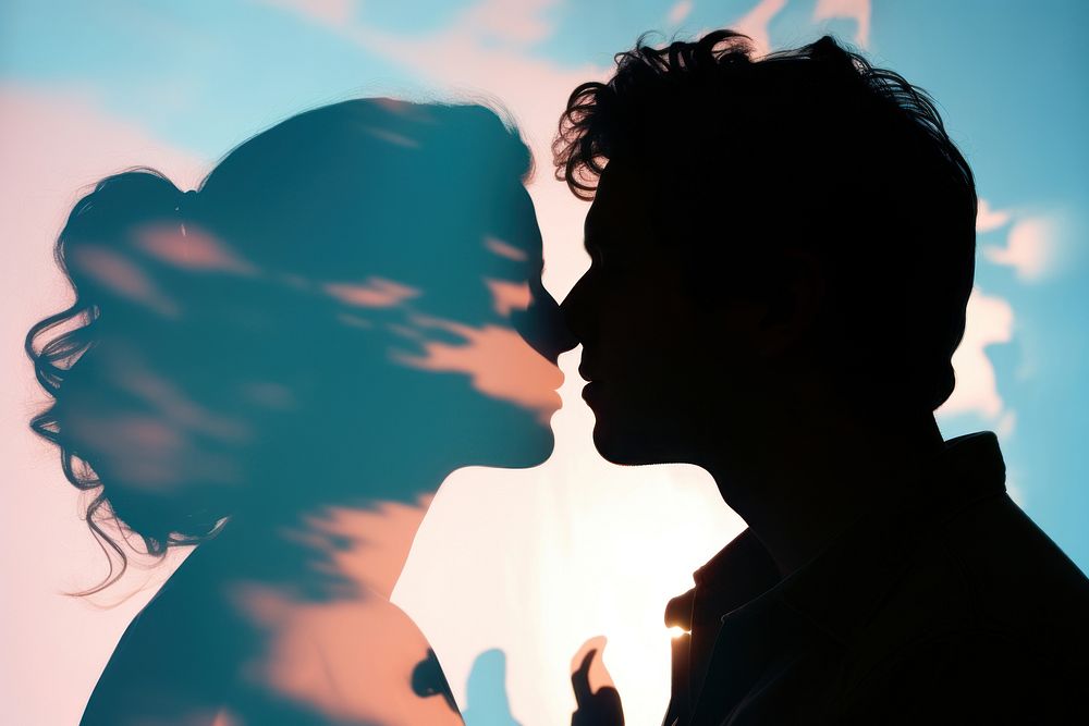  Couple silhouette romantic kissing. 